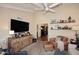 Comfortable living room with hardwood floors and TV at 25 E San Miguel E Ave, Phoenix, AZ 85012