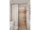 Modern walk-in shower with tiled walls and bronze fixtures at 25 E San Miguel E Ave, Phoenix, AZ 85012