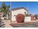 Exterior view of multi-Gathering home with red tile roof, desert landscaping, and parking at 2828 E Waltann Ln # 1, Phoenix, AZ 85032
