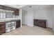 Updated kitchen featuring stainless steel oven, neutral backsplash and wood cabinets at 2828 E Waltann Ln # 1, Phoenix, AZ 85032