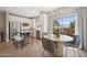 Open floor plan with kitchen, dining area and stainless steel appliances at 2843 W Eagle Talon Rd, Phoenix, AZ 85085