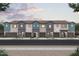 Charming townhome exteriors boast colorful accents and attached garages at 2843 W Eagle Talon Rd, Phoenix, AZ 85085