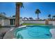 Backyard pool with mature landscaping and desert modern style home at 3417 E Lupine Ave, Phoenix, AZ 85028