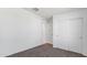 Bedroom boasts carpeted floors, neutral walls, and a closet for storage at 35474 N Breezy Ln, San Tan Valley, AZ 85140