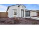 Stylish single-Gathering house with a two-car garage, desert landscaping, and a welcoming entrance at 3841 S 233Rd Ln, Buckeye, AZ 85326