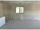 Bedroom under construction showing an unfinished window and electrical work in a home awaiting final touches at 5629 W Mcneil St, Laveen, AZ 85339