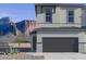 Beautiful home exterior showcasing modern design and stunning mountain views at 5850 E Ringtail Way, Phoenix, AZ 85054
