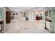 Open living space flows from kitchen to entry with marble floors at 7042 N 12Th Way, Phoenix, AZ 85020