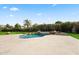 Inviting outdoor pool features beautiful rock features and a spacious travertine deck, perfect for relaxation at 7157 E Bronco Dr, Paradise Valley, AZ 85253