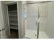This bathroom features a tiled shower with a glass door at 7272 E Hackamore Ln, San Tan Valley, AZ 85143