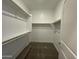 Walk-in closet featuring two bars for hanging clothes at 7272 E Hackamore Ln, San Tan Valley, AZ 85143