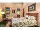 Bedroom with hardwood floors, a window offering a view of the desert landscape, and natural light, perfect for relaxation at 7413 E Lower Wash Pass, Scottsdale, AZ 85266