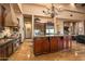 Large gourmet kitchen with a center island and stainless steel appliances at 7413 E Lower Wash Pass, Scottsdale, AZ 85266
