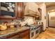 Close up view of the oven and backsplash at 7413 E Lower Wash Pass, Scottsdale, AZ 85266