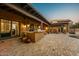Expansive outdoor patio featuring a built-in grill and a pool, perfect for outdoor entertaining and enjoying the Arizona lifestyle at 7413 E Lower Wash Pass, Scottsdale, AZ 85266