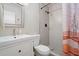 Clean bathroom with stylish shower, vanity, modern fixtures, and a unique shower curtain at 8213 E Whitton Ave, Scottsdale, AZ 85251