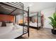 Spacious bedroom with multiple bunk beds, perfect for accommodating a large Gathering or group at 8213 E Whitton Ave, Scottsdale, AZ 85251