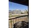 Balcony view of the neighborhood with well-maintained landscaping at 8302 N 21St Dr # L204, Phoenix, AZ 85021