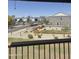 A serene balcony view showcasing manicured greenery and a well-maintained community landscape at 8302 N 21St Dr # L204, Phoenix, AZ 85021