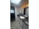 Bathroom with updated fixtures, tile floors and a clean aesthetic offering a refreshed look at 8302 N 21St Dr # L204, Phoenix, AZ 85021