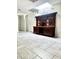 Hallway with skylight and hardwood cabinet at 8302 N 21St Dr # L204, Phoenix, AZ 85021