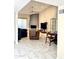 Spacious living area with fireplace, TV, seating, and plenty of natural light at 8302 N 21St Dr # L204, Phoenix, AZ 85021