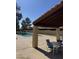Outdoor pool area with covered seating, perfect for enjoying sunny days by the pool at 8302 N 21St Dr # L204, Phoenix, AZ 85021