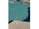 This photo captures the clean water and the 4 ft marker at the edge of the pool at 8302 N 21St Dr # L204, Phoenix, AZ 85021