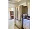 Modern kitchen featuring a stainless steel LG refrigerator with ice maker and water dispenser, complemented by stylish countertops at 8302 N 21St Dr # L204, Phoenix, AZ 85021