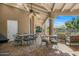 Spacious outdoor patio with multiple seating areas, perfect for entertaining guests at 8712 N 64Th Pl, Paradise Valley, AZ 85253