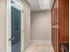 Walk-in pantry with custom cabinetry, pantry door and convenient storage space at 8712 N 64Th Pl, Paradise Valley, AZ 85253