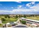 Stunning aerial view of a golf course community with lush greenery and scenic mountain backdrop at 9617 E Monterey Ave, Mesa, AZ 85209