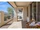 Covered patio with stone flooring, columns, and a view of the backyard at 1024 E Frye Rd # 1063, Phoenix, AZ 85048