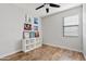 Functional bedroom featuring decoratively displayed wall art and a minimalist design at 1051 W Inca St, Mesa, AZ 85201