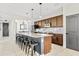 Spacious kitchen island with granite countertop, seating for six, stainless appliances at 1051 W Inca St, Mesa, AZ 85201