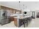 Spacious kitchen island with granite countertop, seating for six and open to the living area at 1051 W Inca St, Mesa, AZ 85201