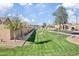 This community features well-manicured lawns, mature trees, and street parking, creating a welcoming street view at 1051 W Inca St, Mesa, AZ 85201