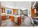 Modern kitchen equipped with stainless steel appliances, center island, and sleek cabinetry at 10801 E Happy Valley Rd # 4, Scottsdale, AZ 85255