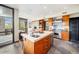 Spacious kitchen with stainless steel appliances, center island, and stone accents, perfect for cooking at 10801 E Happy Valley Rd # 4, Scottsdale, AZ 85255