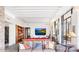 Bright living area features a pool table, built in shelves, and large windows with views at 10801 E Happy Valley Rd # 4, Scottsdale, AZ 85255