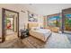 Serene bedroom with natural light, stylish decor, and views, creating a relaxing retreat at 10801 E Happy Valley Rd # 4, Scottsdale, AZ 85255
