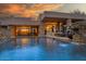 Inviting backyard pool area with stone accents, perfect for relaxation and outdoor enjoyment with sunset view at 10801 E Happy Valley Rd # 4, Scottsdale, AZ 85255