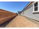 Expansive backyard featuring a block fence, offering lots of potential for landscaping and outdoor enjoyment at 12029 W Marguerite Ave, Avondale, AZ 85323