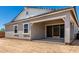 Home exterior featuring a covered patio and an expansive backyard ready for landscaping at 12029 W Marguerite Ave, Avondale, AZ 85323
