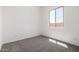 Bedroom with plush carpet and a view at 12029 W Marguerite Ave, Avondale, AZ 85323