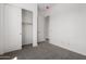 Bedroom with closet and access to a bathroom at 12029 W Marguerite Ave, Avondale, AZ 85323