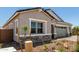 Inviting single-Gathering house with stone accents, a two-car garage, and low-maintenance desert landscaping at 12029 W Marguerite Ave, Avondale, AZ 85323
