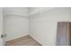 Walk-in closet featuring hanging rods and shelves at 12123 W Bell Rd # 241, Surprise, AZ 85378