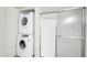 This practical laundry room features a stacked washer and dryer for space-saving convenience at 12123 W Bell Rd # 241, Surprise, AZ 85378