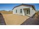 The backyard features a blank canvas, ready to be designed into your dream outdoor space at 15065 W Hackamore Dr, Surprise, AZ 85387